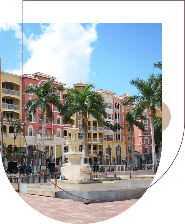 A picture of the city with palm trees.